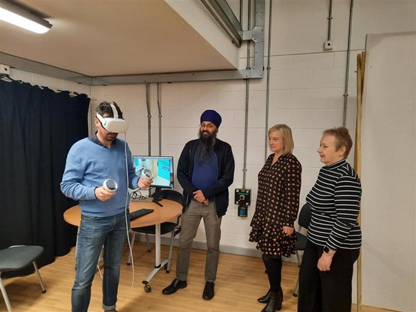 Individuals test out the VR prototype