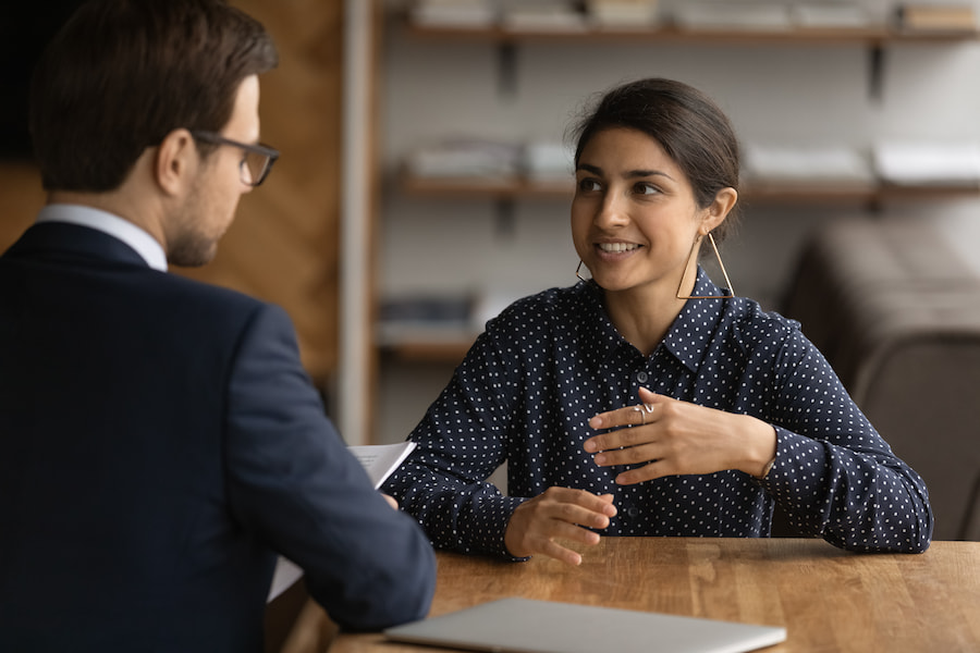 Learning For Work, Two People Talking At Desk